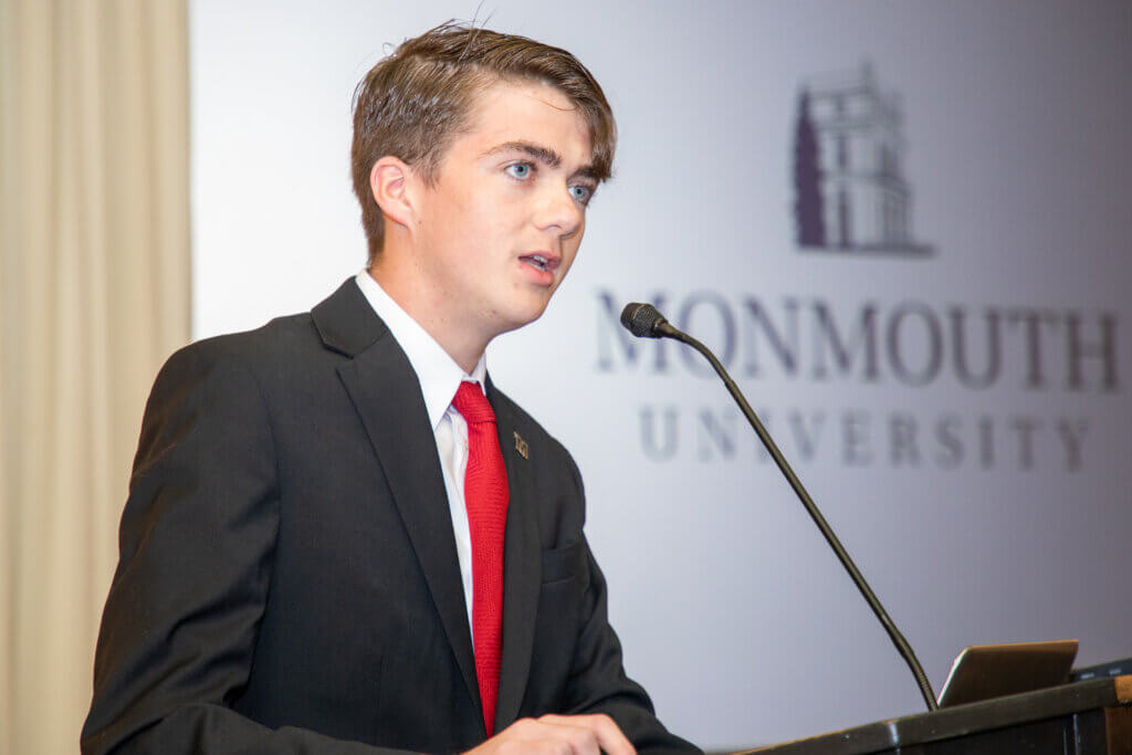 Monmouth University speaks at the podium during a recent event