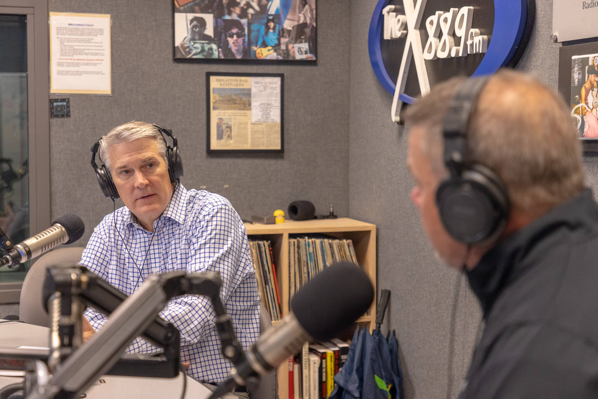 President Leahy and Professor Harmon recording their podcast in the WMCX studio