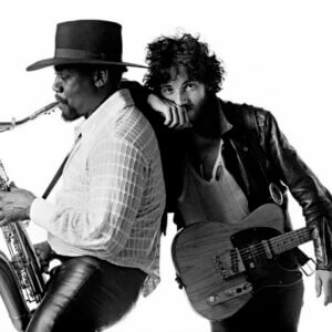 archival black and white image of Clarence Clemmons and Bruce Springsteen from outtakes of Born to Run album photo session