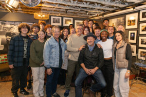 Music industry students with Specialist Professor Joe Rapolla, Bob Santelli, executive director of the Bruce Springsteen Archives & Center for American Music, and noted photographer Danny Clinch, at his studio in Asbury Park, New Jersey