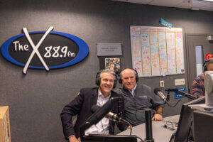 President Patrick Leahy and Head Coach Kevin Callahan in the studios of WMCX