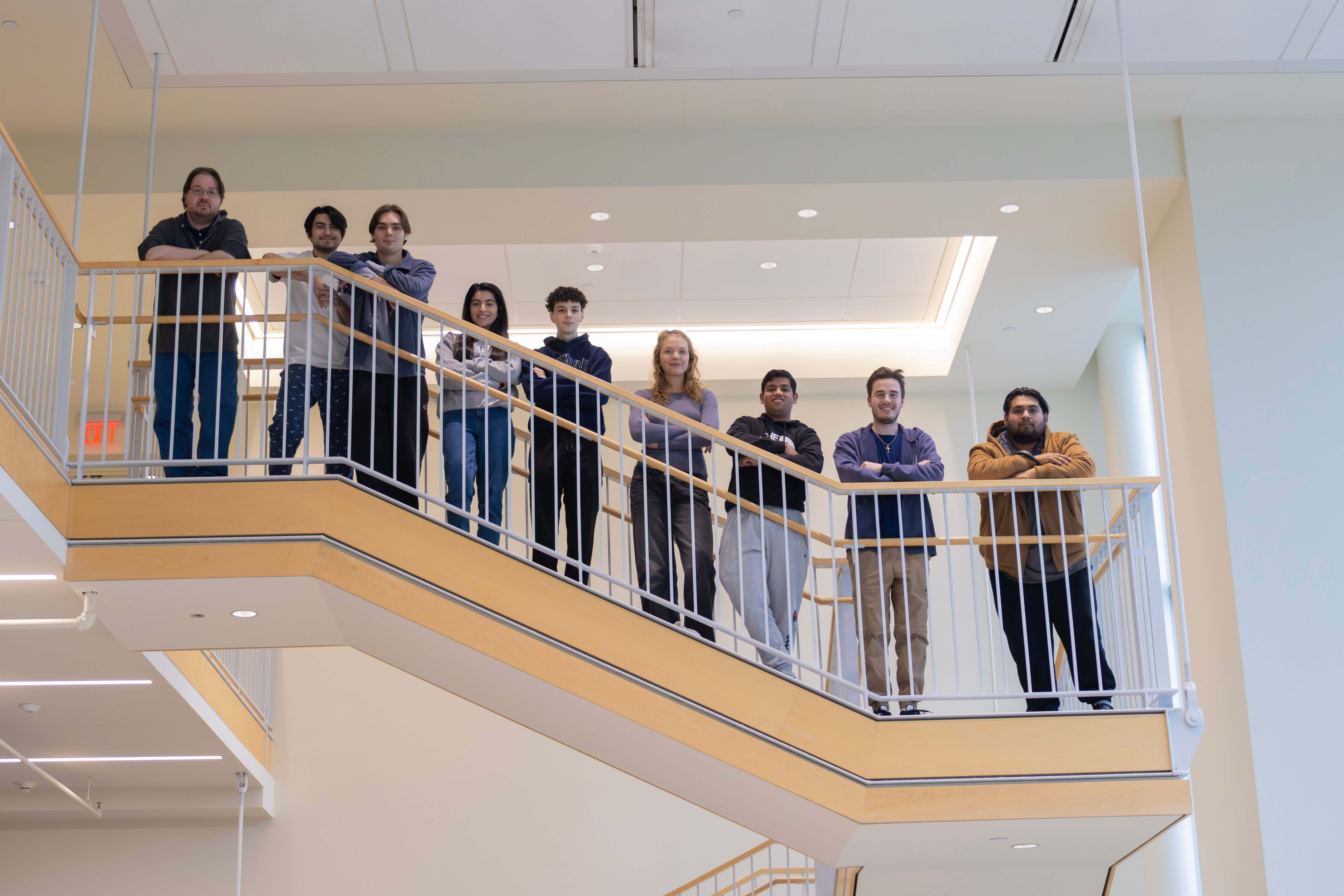Specialist Prof. Brian Callahan and members of the Cyber Hawks team