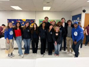Monmouth University Debate Hawks with the members of the National Prison Debate League.