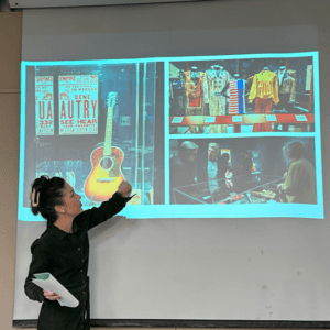 Melissa Ziobro points to lecture materials