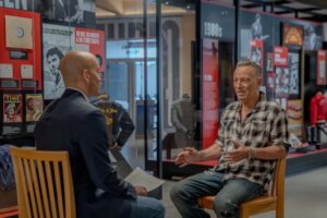 Brcue Springsteen talks with PBS New Hour host Geoff Bennett