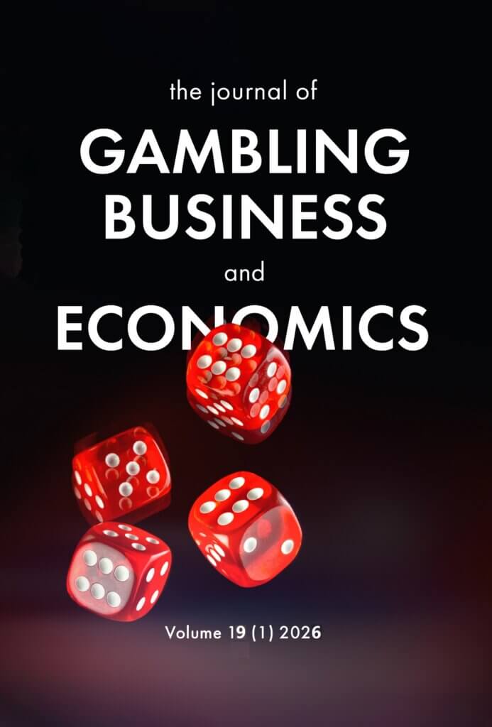 Cover of the academic journal of Gambling and Economics, with link to article written by professor Scott. The cover is dark and has a pair of dice in action.