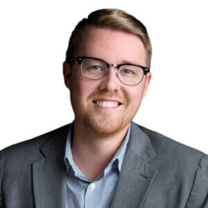 Headshot of smiling man with glasses, Adjunct professor Bill Elwell