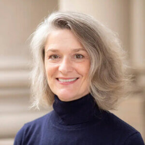 Prof. Susan Meyer standing outside Great Hall