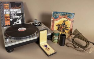 A curated collection of artifacts representing different era of American history.