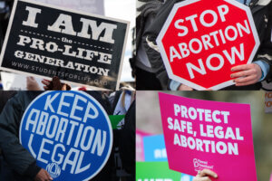 Image of signs both for and against abortion.