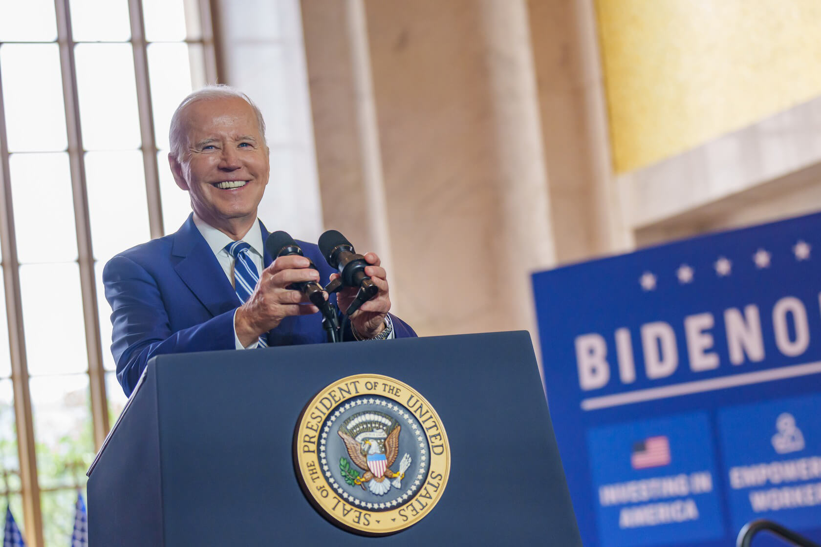Image of president Biden behind podium