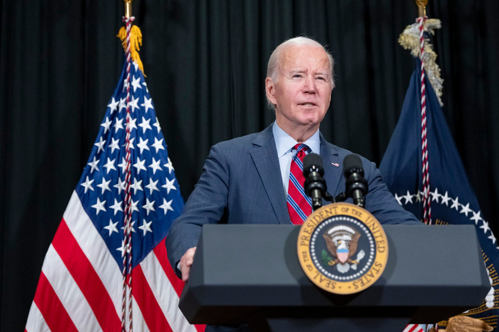 Image of President Biden at podium.