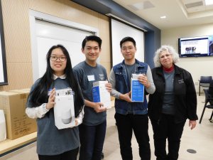 1 female student, 2 male students and MU Professor Kretsch holding Google Home and Chromecast won for 2nd place in Monmouth University High School Programming contest 2019