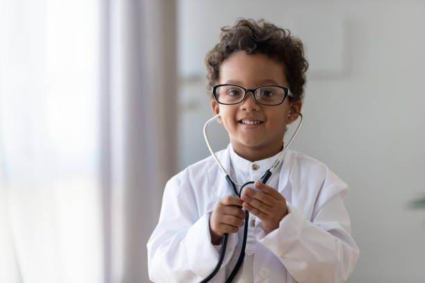 Child wearing a doctor costume