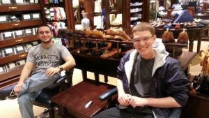 Photo shows Patrick with his School of Science protege (now Peer Mentor) Harris Kittner, at Brooks Brothers waiting for a fitting before the Communicate Your Professionalism event in 2012.