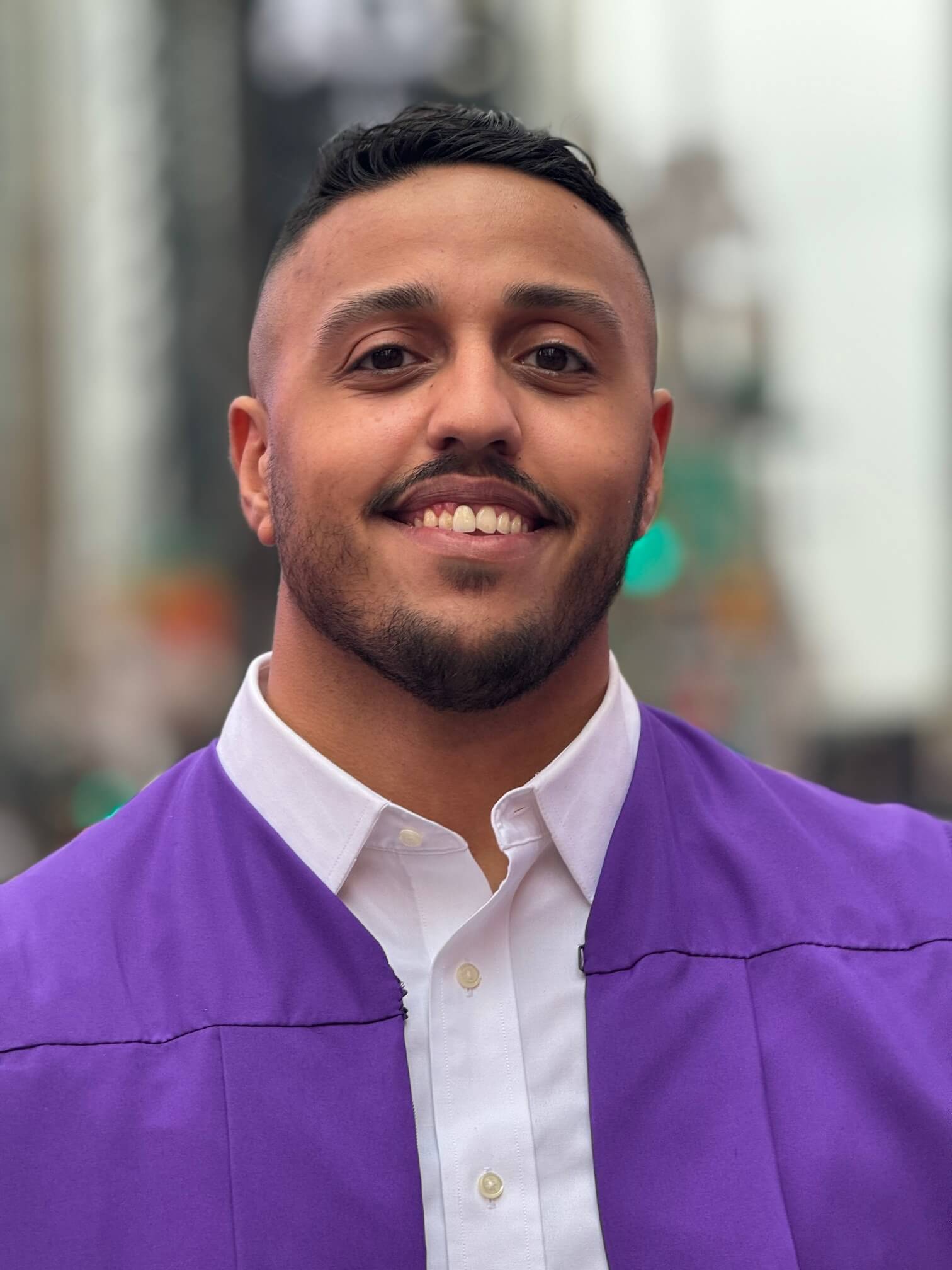 Alumnus Mahomud Shabana is pictured in his NYU regalia