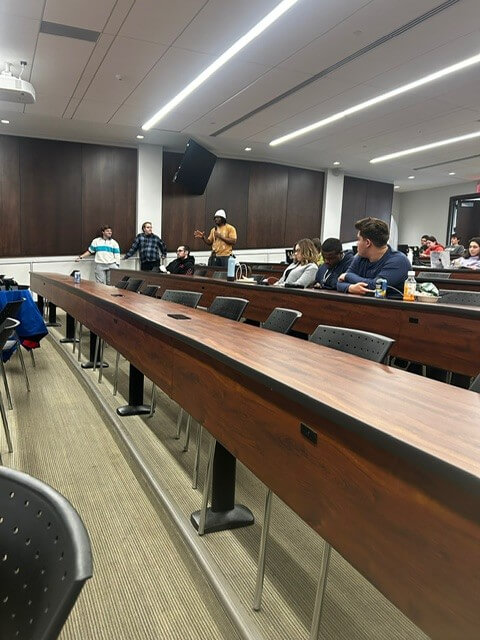 Students in audience asking questions