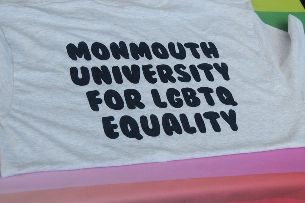 Close up of a shirt with the words "Monmouth University for LGBTQ Equality" written on it. 
