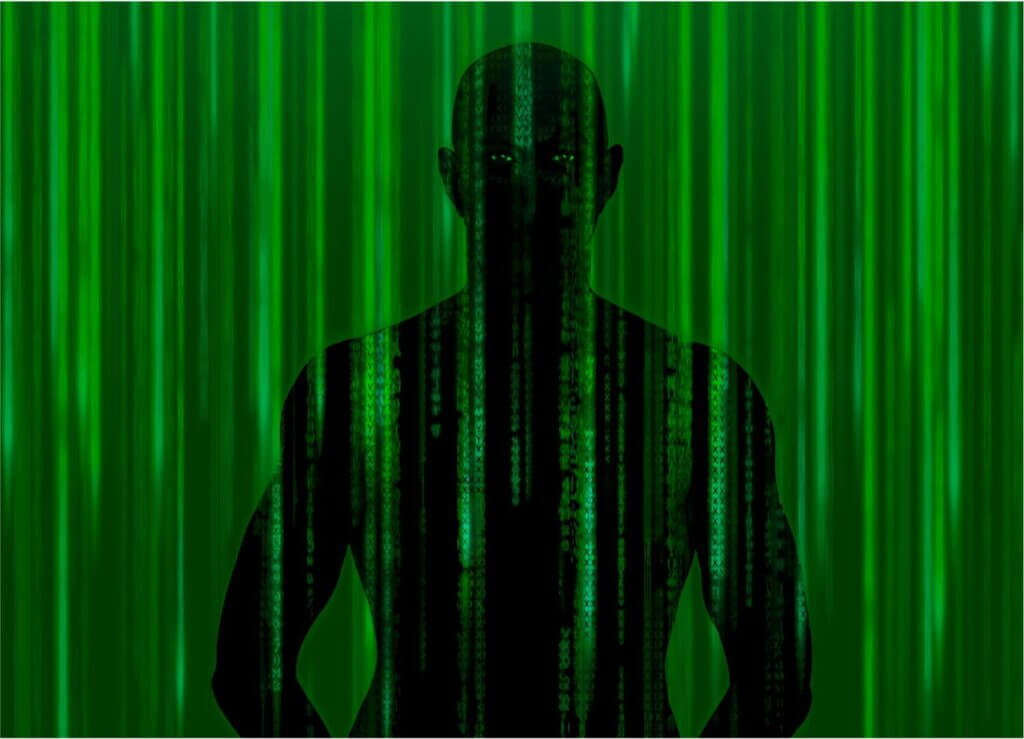 An image reminiscent of the green raining code motif from The Matrix, with a dark figure behind it shown from the waist up, their eyes the only visible feature