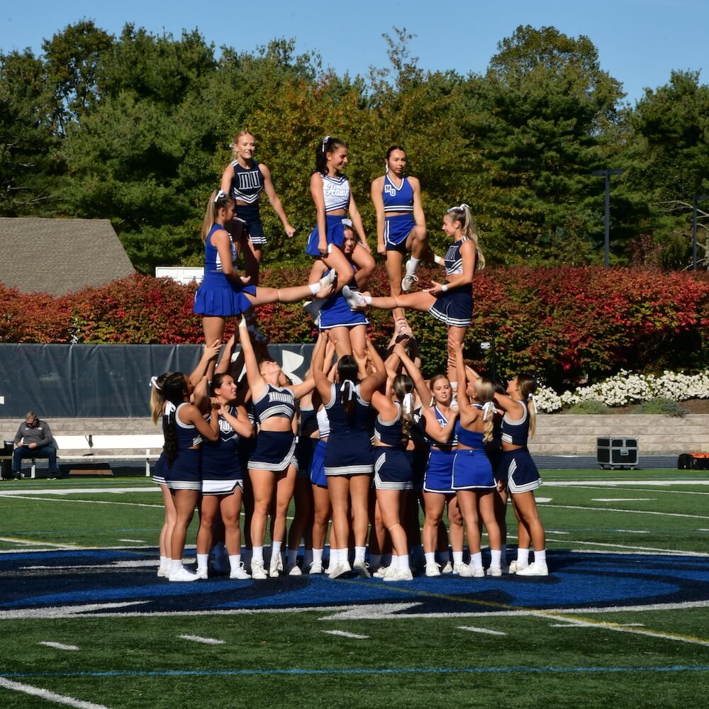 Photo of the Monmouth Dance Team in a tower formation