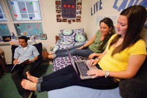 Students studying in a dorm room