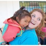Photo of MU student having fun with youngster in Guatemala - Click to view larger image