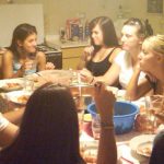 Photo of MU students eating home cooked meal in Italy- Click to view larger image