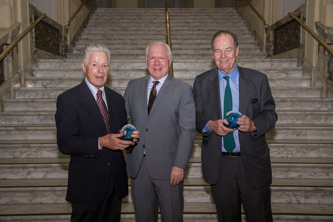 Photo shows UCI Director Tony MacDonald flanked by former NJ Governors James Florio (left) and Thomas Kean, who are among the 2018 Coastal and Ocean Champion Award Honorees