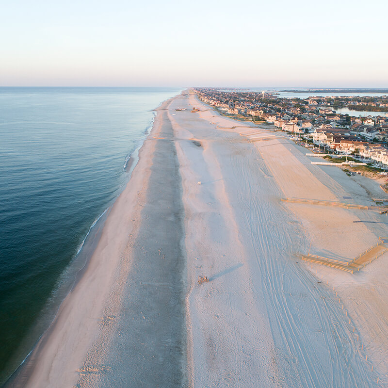 An aerial image of a calm beach