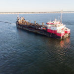 Photo of large cargo ship on water