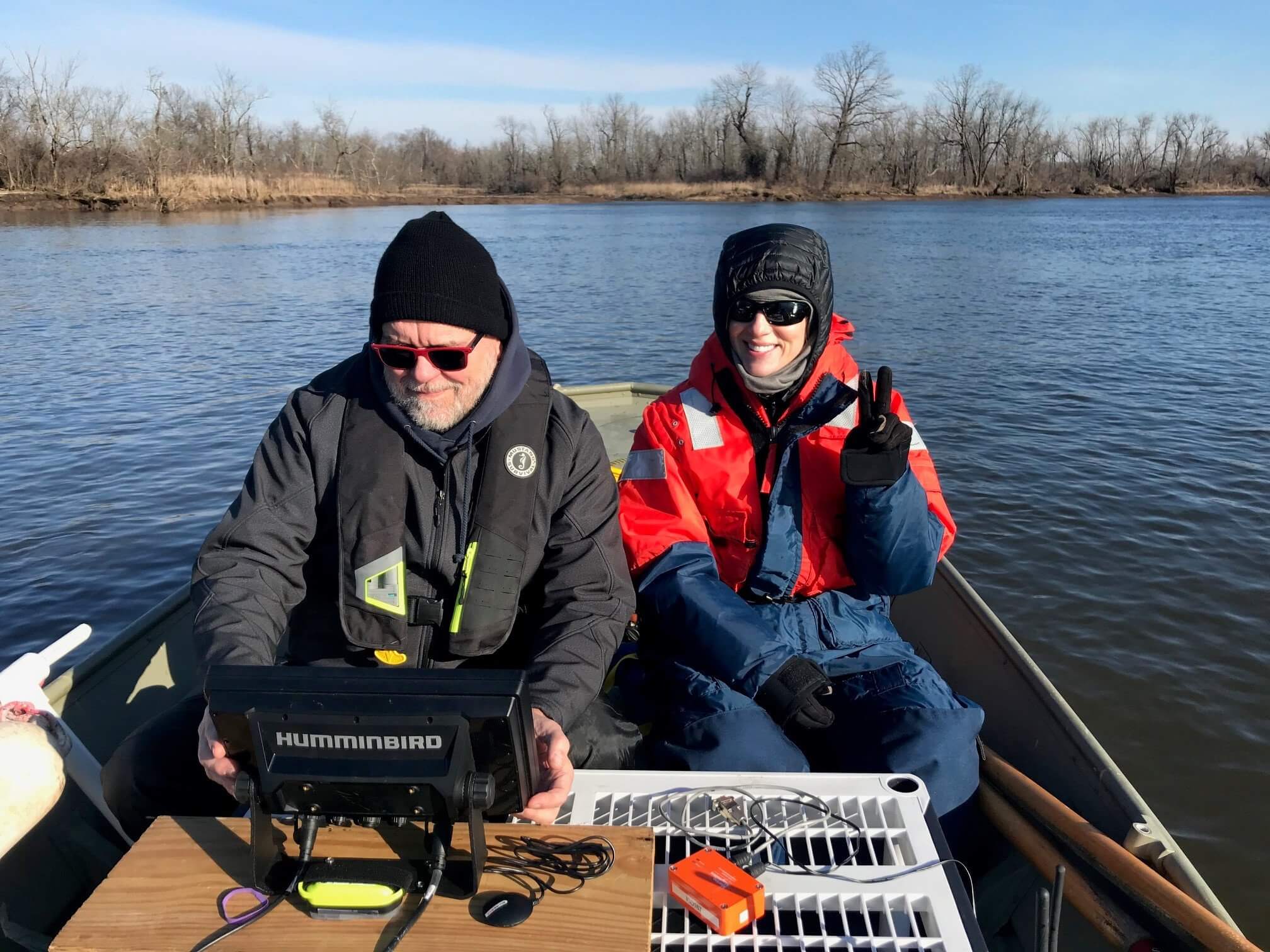 Photo of MU graduate student Jaclyn Urmey (right) and Stockton University Adjunct Professor Steve Nagiewicz scanning Crosswicks Creek in February.