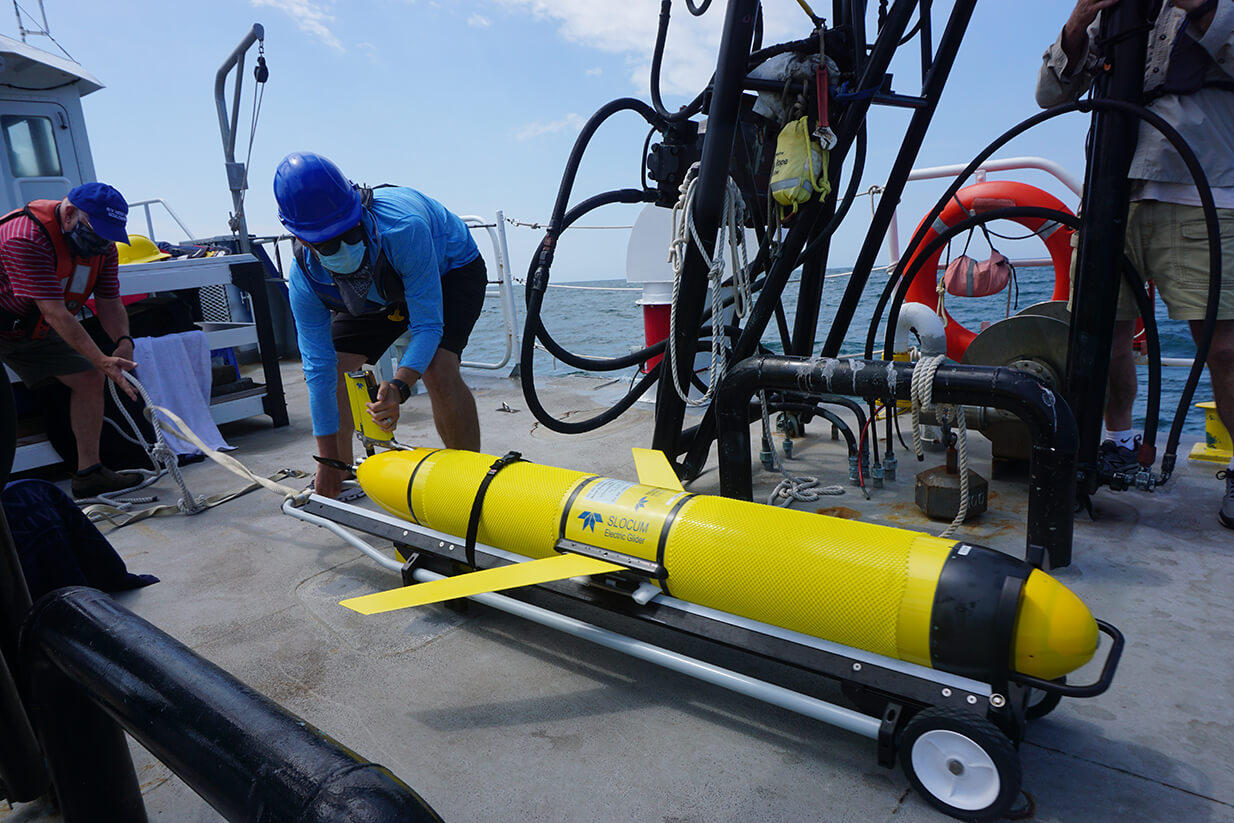 Researcher preps the glider prior to launch