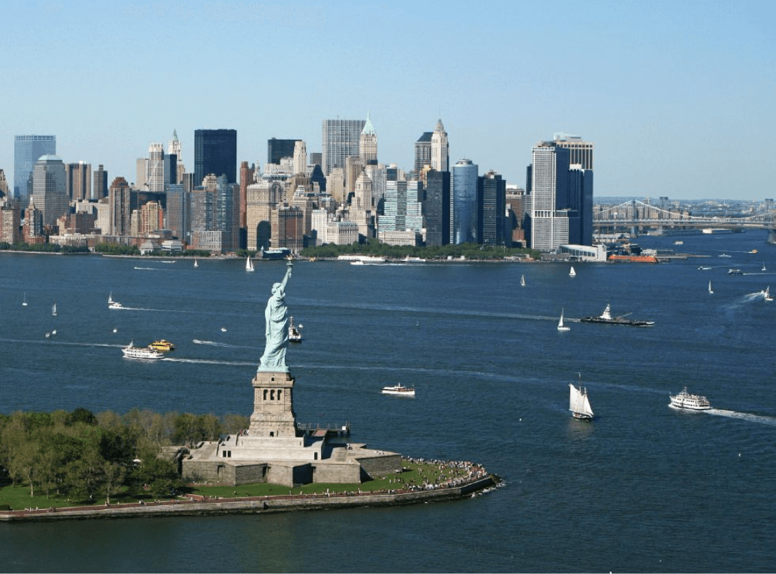 On aerial view of New York City and The Statue of Liberty.
