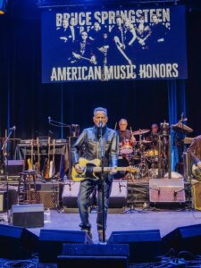 Music history was made at Monmouth. 🎶🎸

The Bruce Springsteen Center for American Music hosted the fourth annual American Music Honors, celebrating artists who have demonstrated artistic excellence, creative integrity, and a lasting commitment to American music culture.

This year’s honorees: Dionne Warwick, Dr. Dre, The Doors, the E Street Band, and Patti Smith — with a posthumous honor presented to The Band.

The night closed with an unforgettable full-room performance of “People Have the Power” led by Bruce Springsteen and the evening’s honorees. A night to remember. 💙🎶

📸: @redemartin